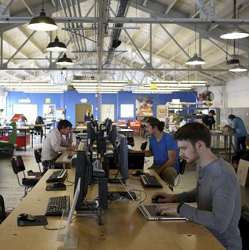 Designers work at computer stations at TechShop, a hackerspace in San Francisco. 