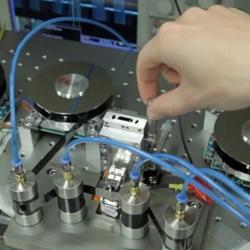 IBM researchers test their new tape prototype.