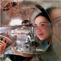 ANL chemist Karena Chapman peers inside vacuum tank 