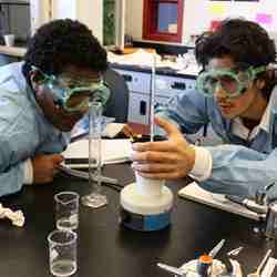 Students in a science lab. 