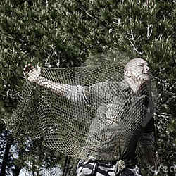 A man caught in a net.