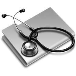 A modern doctor's tools: stethoscope and notebook computer. 
