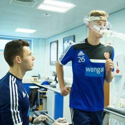 Adam King and fellow Hearts players undertake tests under the watchful eyes of the Heriot-Watt team.