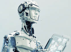 A robot reading a tablet. 