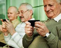 Older men using smartphones. 