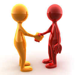 Cooperation, symbolized by a handshake.