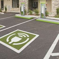 Wireless charging stations built into electric vehicle parking spots at Google headquarters. 