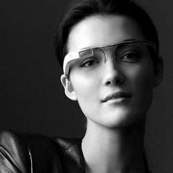 A woman wearing Google Glass.