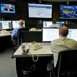 Cybersecurity analysts work in the "watch and warning center" of the U.S. governments cyber defense lab in Idaho Falls, ID.