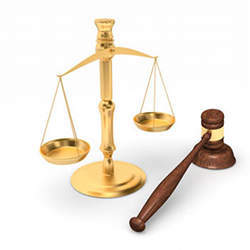 The scales of justice, and a judge's gavel.