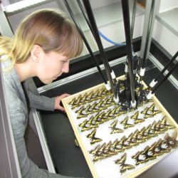 Rita Velez with collection tray