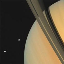 Saturn and its moons Tehtys and Dione