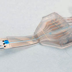 An implant made of silicone and gold wires is as stretchy as human tissue.