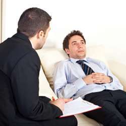 A man being treated by a psychiatrist.