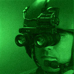 A soldier using night vision goggles. 