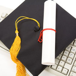 diploma and keyboard