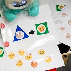 The root components of the programming system are triangular and circular stickers  which represent stimuli and responses, respectively  and arrow stickers, which represent relationships between them. 