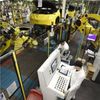 How Factory Workers Learned to Love Their Robot Colleagues