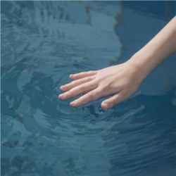Hand rippling water
