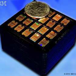 A fab cassette carrying several hundred chips for 100 Gbps transceivers, diced from a single CMOS wafer using IBM's Integrated Nano-Photonics Technology, which integrates optical and electrical devices on the same monolithic chip.