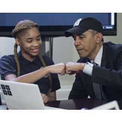 President Obama fist-bumps a middle-school student participating in an Hour of Code event to honor Computer Science Education Week at the White House in Washington on December 8, 2014. 