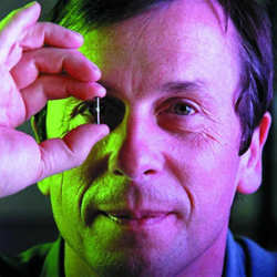 Kevin Warwick, a professor of cybernetics at Coventry University, shows an RFID transmitter like the one what was implanted in his arm in 1998. 