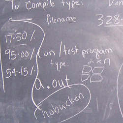 A blackboard in a computer science classroom.