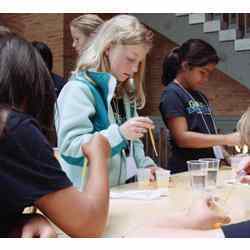 In a materials science workshop, girls used a chemical reaction to make their own edible juice caviar.