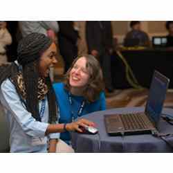 A Tennessee student remotely manipulates a research-grade microscope at a March GENI Engineering conference in Washington, D.C.