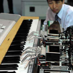 A piano-playing robot.