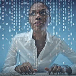 A woman reviewing code.