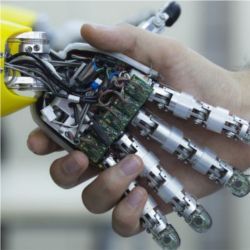 Robot hand in human hand