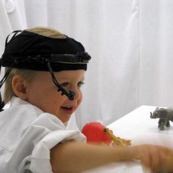 toddler wearing a head-mounted camera