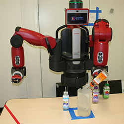 A robot mixes a cocktail after watching a person perform the task.