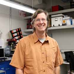 University of Arizona School of Information associate professor Clayton Morrison in his robotics lab.