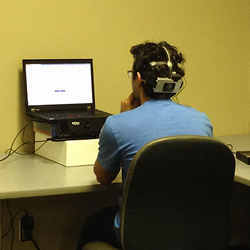 The research team set up an EEG headset for measurement of brain signals.