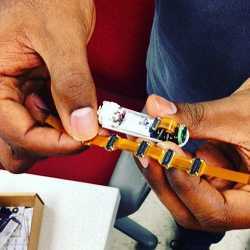 National Science Foundation Graduate Fellowship recipient Addisu Taddese holds a medical capsule robot.