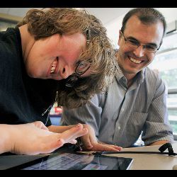 student using touchscreen