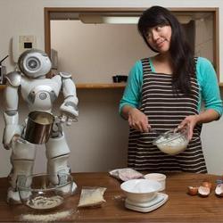 Angelica Lim and the Pepper robot.