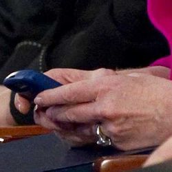 Clinton with smartphone