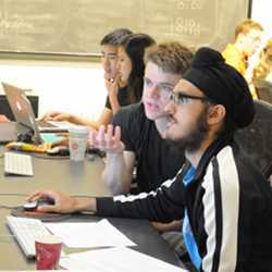 omputer science students collaborate in Princeton's Friend Center teaching lab.