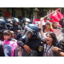 Mexicos Revolutionary Action Group protests to end government corruption and improve worker rights. 