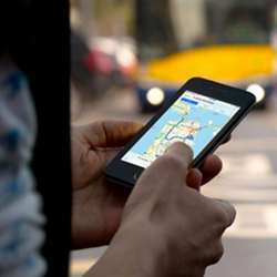 A smartphone users checks an online map. 