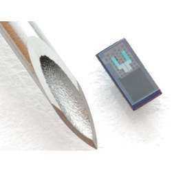 An implantable sensor, compared to the tip of a syringe.