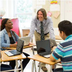 Travis High School teacher and students