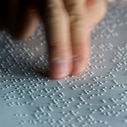 "Reading" braille. 