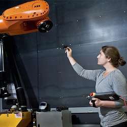 Carnegie Mellon University researcher Madeline Gannon teaches a robot.