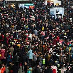 Passengers crowd the Shanghai Hongqiao railway station.