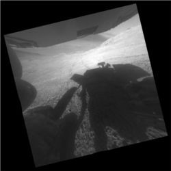 Opportunity rover shadow and tracks on Mars