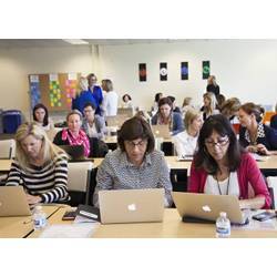 Women brush up on their tech skills during a session at the Reboot Career Accelerator for Women. 